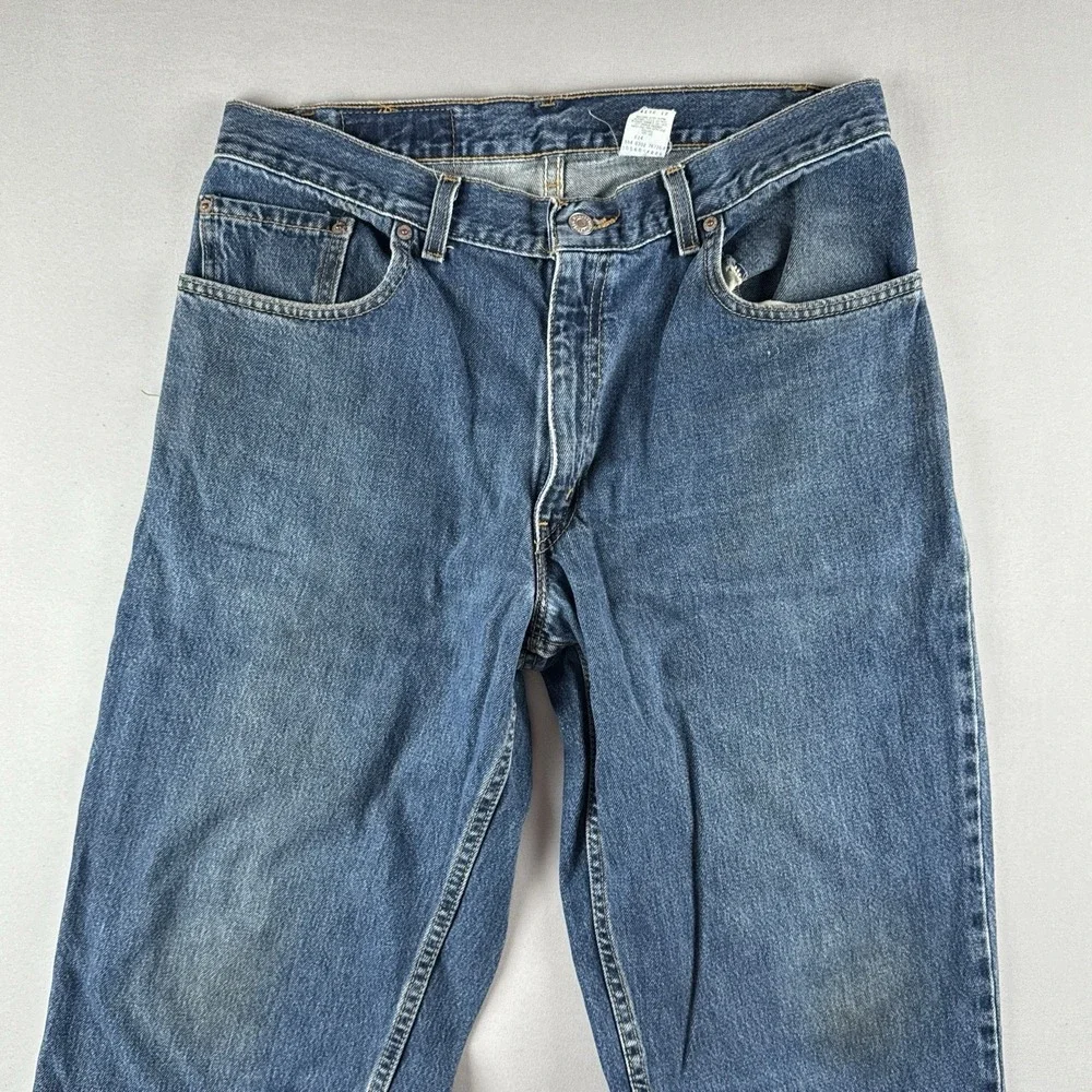 Vintage Levi's 560 Loose Tapered Jeans 34x30 Medium Wash Made In USA